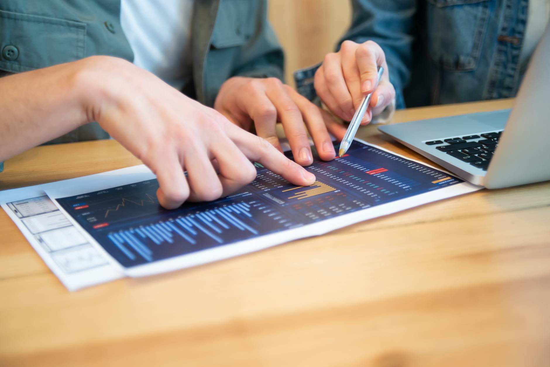 Professional consultation workspace with planning materials and charts